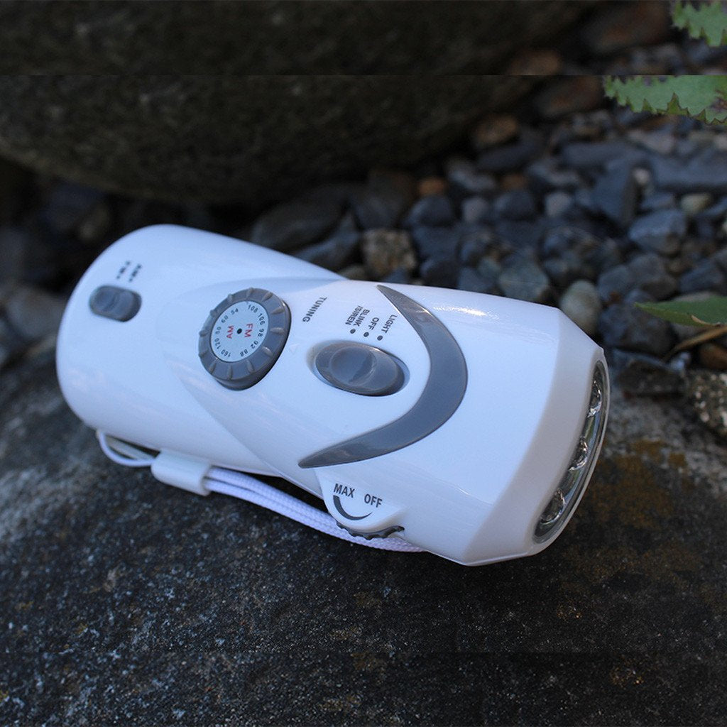 hand-crank light and radio with USB device charger outside light off