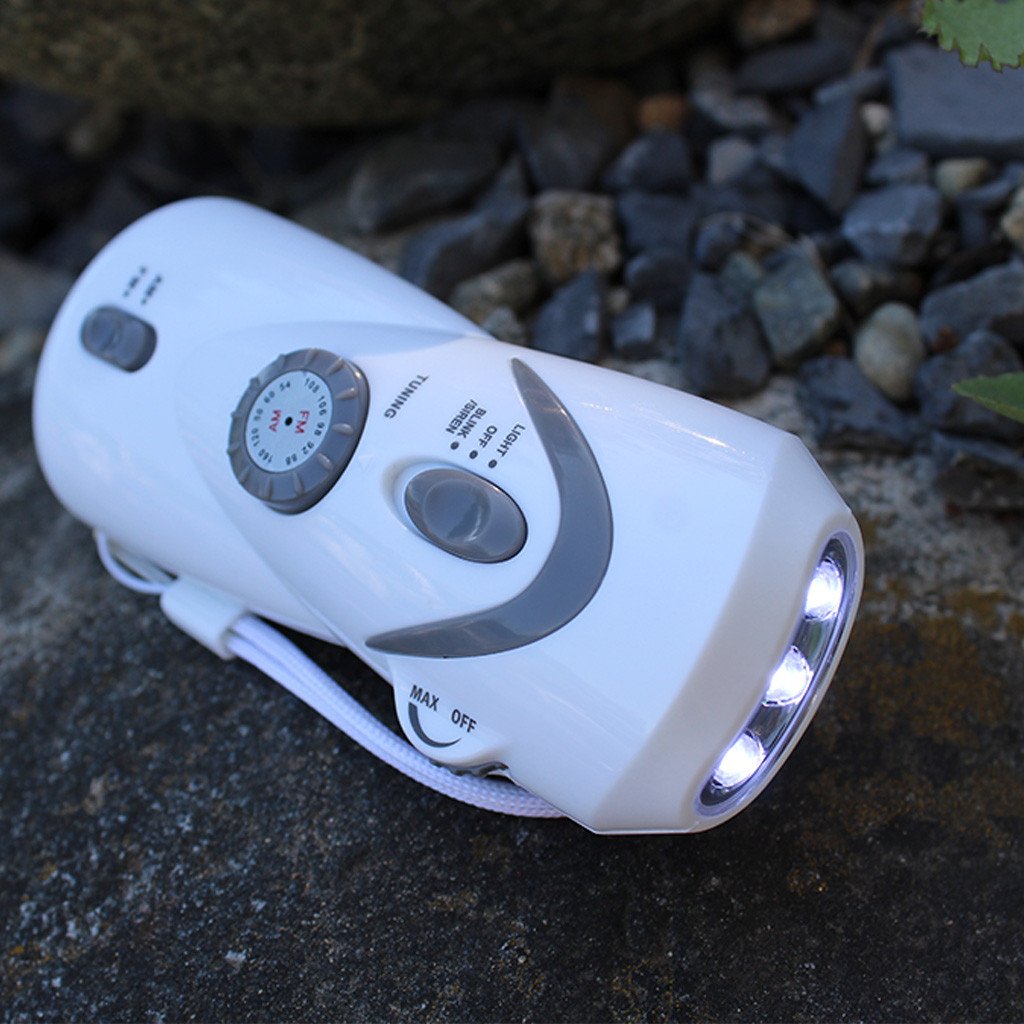 hand-crank light and radio with USB device charger light on